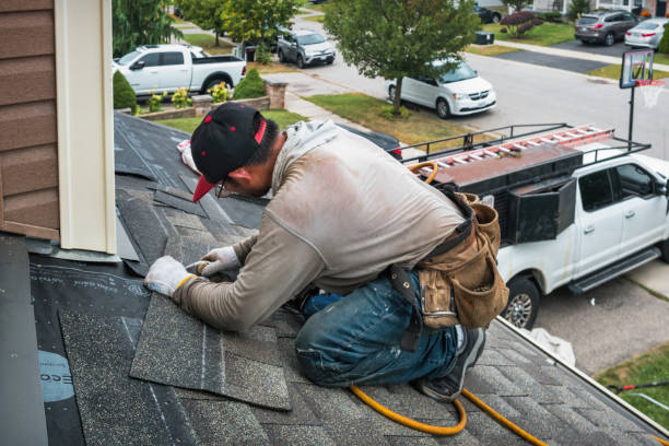 Professional Storm Damage Roof Repair technician working in Granby, CT